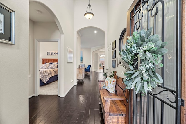 19718 Yellow Hibiscus Ln, Cypress, TX 77433 - foyer featuring dark wood-type flooring and arched walkways
