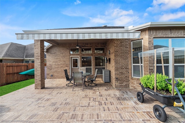 19718 Yellow Hibiscus Ln, Cypress, TX 77433 - view of patio with ceiling fan and outdoor dining space