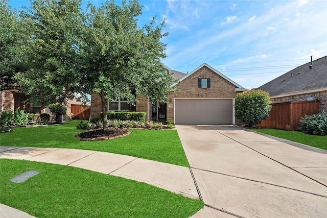 19718 Yellow Hibiscus Ln, Cypress, TX 77433 - view of front of home with brick siding, driveway, and a garage