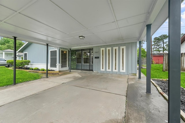10427 Envoy St, Houston, TX 77016 - view of patio featuring a carport