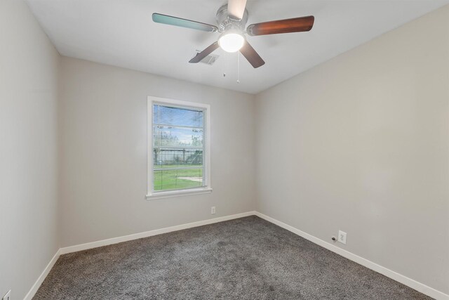 10427 Envoy St, Houston, TX 77016 - spare room with dark colored carpet and ceiling fan