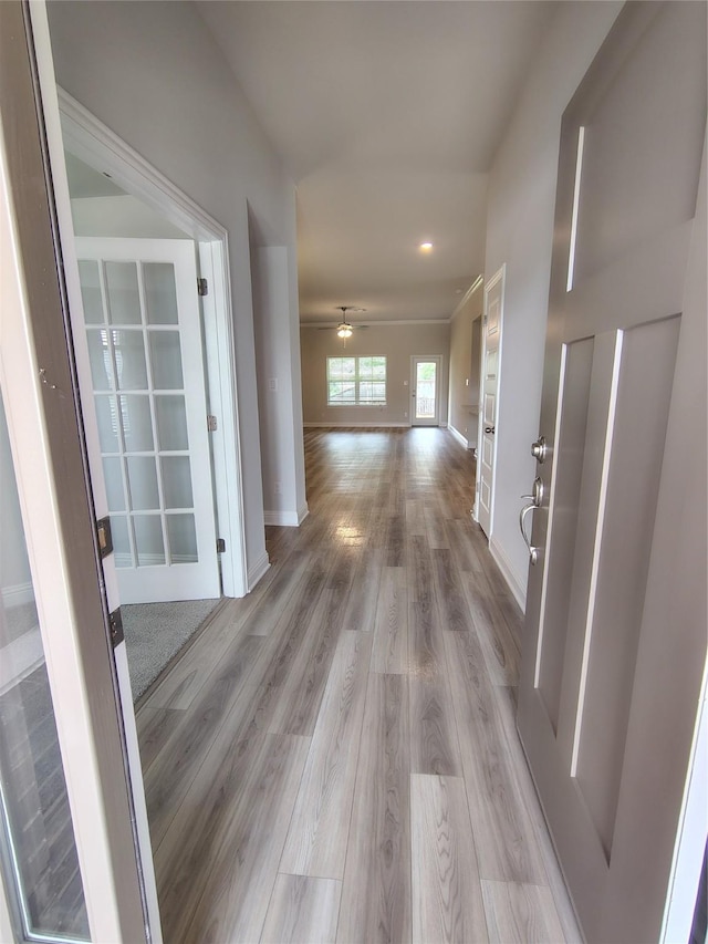 18 Gemstone Ct, Angleton, TX 77515 - hall with light wood-type flooring and recessed lighting