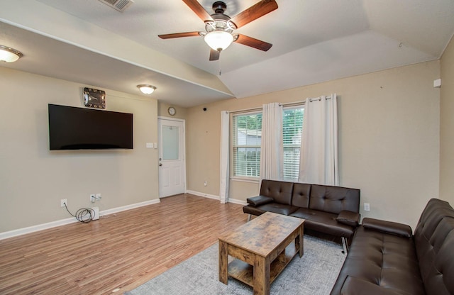 5409 Gold St, Houston, TX 77026 - living room featuring wood finished floors, ceiling fan, and vaulted ceiling