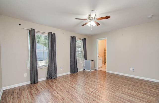 5409 Gold St, Houston, TX 77026 - empty room featuring a ceiling fan, light wood-style flooring, and a smoke detector