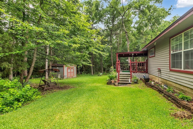 3360 Knob Oaks Dr, Huntsville, TX 77340 - view of grassy yard featuring a shed and a deck