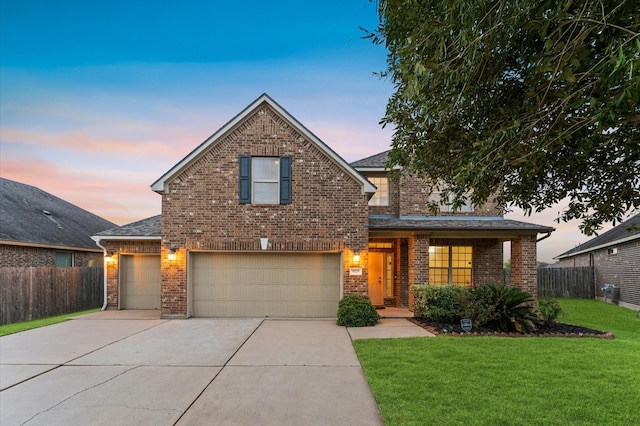 9415 Vista Falls Ct, Richmond, TX 77469 - traditional-style house with brick siding, concrete driveway, a garage, and roof with shingles