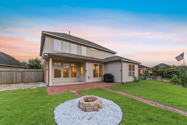 9415 Vista Falls Ct, Richmond, TX 77469 - back of house with a fenced backyard, a fire pit, and a patio area