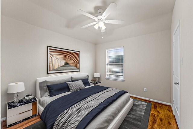 9415 Vista Falls Ct, Richmond, TX 77469 - bedroom with wood finished floors and ceiling fan