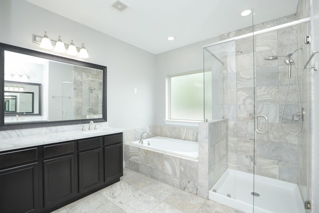 5120 Larkin St, Houston, TX 77007 - full bathroom featuring a garden tub, vanity, a stall shower, and recessed lighting