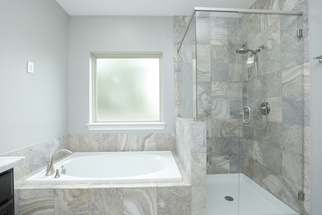 5120 Larkin St, Houston, TX 77007 - full bathroom with a bath, a stall shower, and vanity