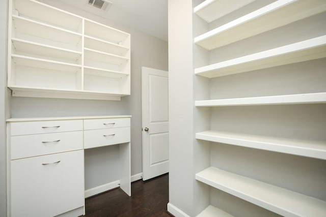 5120 Larkin St, Houston, TX 77007 - walk in closet with dark wood-style floors