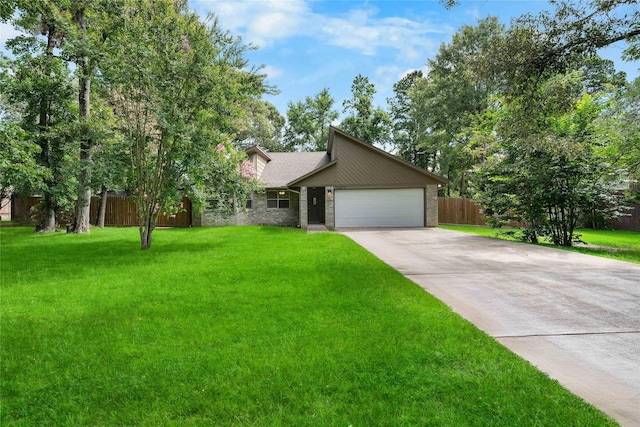 2403 Mustang Dr, Conroe, TX 77384 - mid-century home featuring driveway, a garage, and brick siding