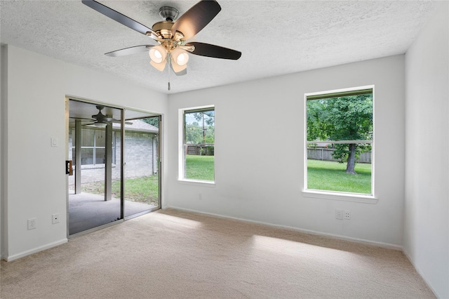 2403 Mustang Dr, Conroe, TX 77384 - unfurnished room with ceiling fan, a textured ceiling, and carpet floors
