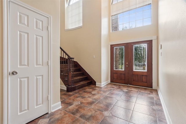 8666 Pearl Point St, Houston, TX 77044 - foyer with a high ceiling and stairway