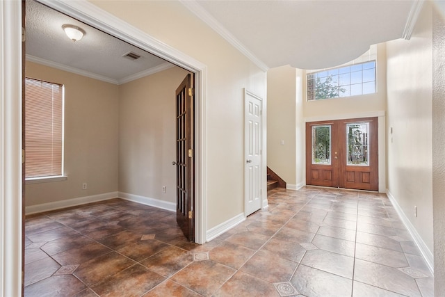 8666 Pearl Point St, Houston, TX 77044 - entrance foyer featuring ornamental molding and stairway