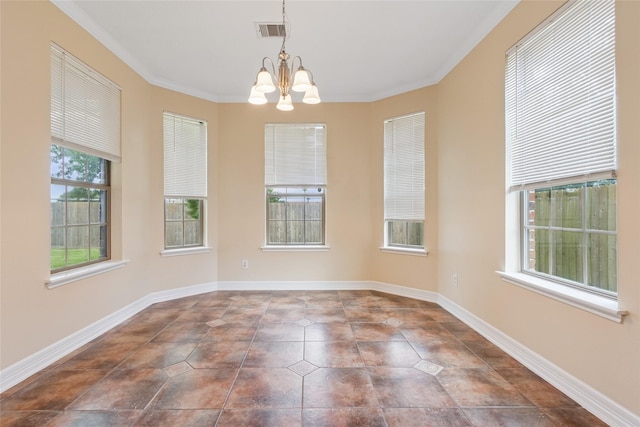 8666 Pearl Point St, Houston, TX 77044 - spare room featuring a chandelier, ornamental molding, and dark tile patterned flooring