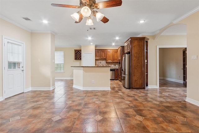 8666 Pearl Point St, Houston, TX 77044 - kitchen featuring appliances with stainless steel finishes, a ceiling fan, backsplash, crown molding, and recessed lighting