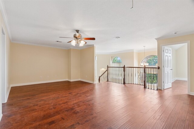 8666 Pearl Point St, Houston, TX 77044 - spare room with ceiling fan, wood finished floors, and crown molding