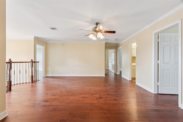 8666 Pearl Point St, Houston, TX 77044 - spare room featuring dark wood-style flooring, a ceiling fan, crown molding, and a textured ceiling