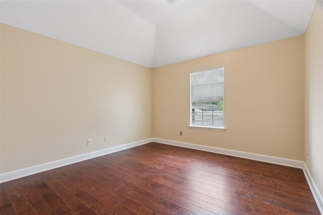 8666 Pearl Point St, Houston, TX 77044 - spare room with lofted ceiling and dark wood finished floors