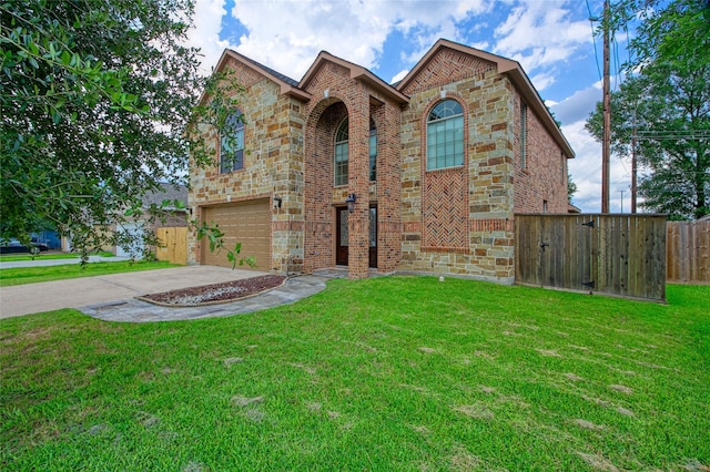 8666 Pearl Point St, Houston, TX 77044 - view of front facade featuring brick siding, concrete driveway, and a garage
