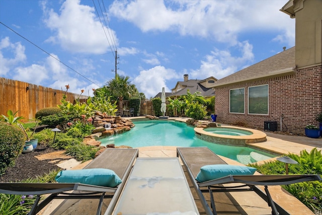 14002 Winding Springs Dr, Cypress, TX 77429 - view of swimming pool featuring a fenced backyard, a patio area, and a pool with connected hot tub