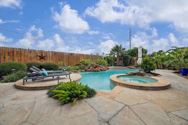 14002 Winding Springs Dr, Cypress, TX 77429 - view of swimming pool featuring a fenced backyard, a patio, and a pool with connected hot tub