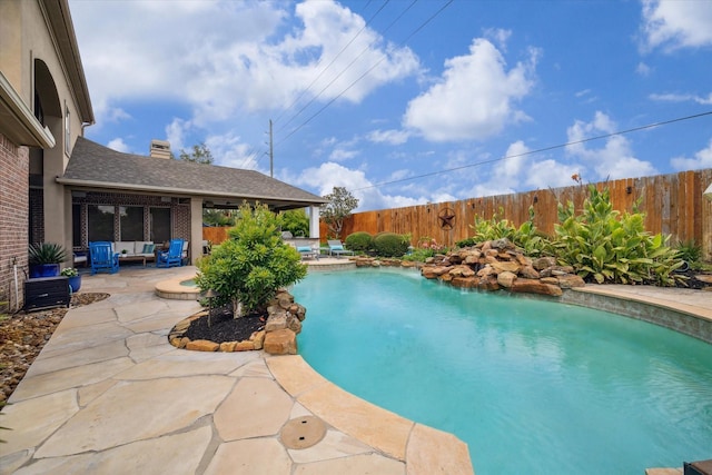 14002 Winding Springs Dr, Cypress, TX 77429 - view of swimming pool with a patio area, a fenced backyard, and an outdoor living space