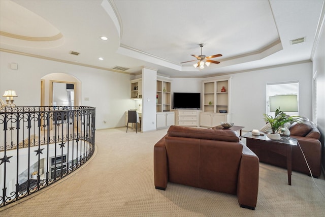 14002 Winding Springs Dr, Cypress, TX 77429 - living room featuring a raised ceiling, crown molding, ceiling fan, carpet flooring, and recessed lighting