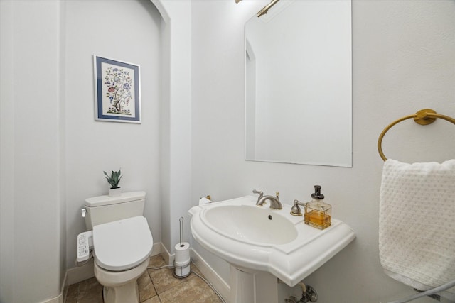 14002 Winding Springs Dr, Cypress, TX 77429 - bathroom featuring toilet and tile patterned flooring