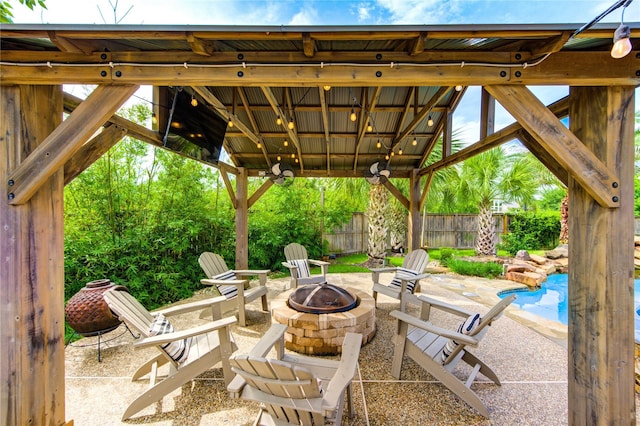 27818 Pinpoint Crossing Dr, Katy, TX 77494 - view of patio featuring an outdoor fire pit