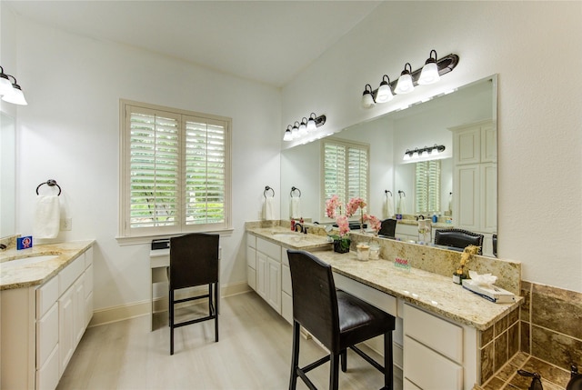 27818 Pinpoint Crossing Dr, Katy, TX 77494 - full bathroom with vanity and wood finished floors