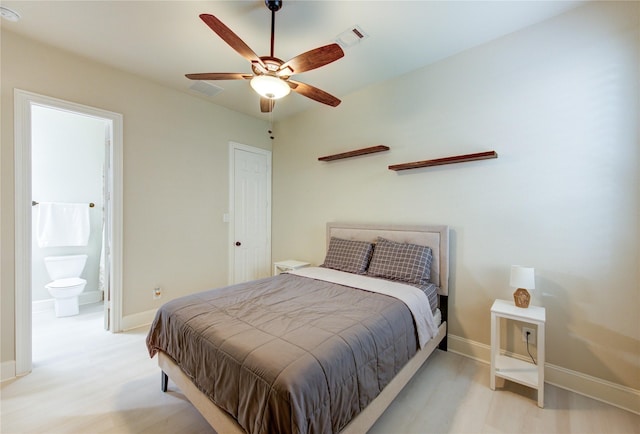 27818 Pinpoint Crossing Dr, Katy, TX 77494 - bedroom with light wood-style floors, a ceiling fan, and ensuite bath