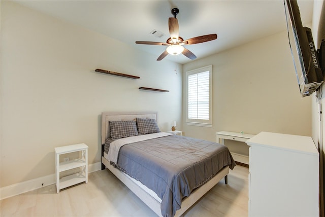 27818 Pinpoint Crossing Dr, Katy, TX 77494 - bedroom with light wood-style flooring and a ceiling fan