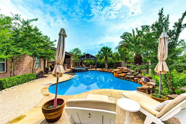 27818 Pinpoint Crossing Dr, Katy, TX 77494 - view of pool with a gazebo, a patio area, a fenced backyard, and a pool with connected hot tub