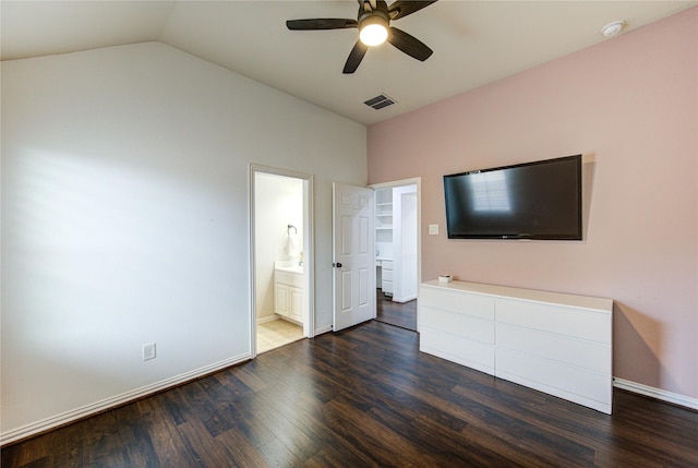 27818 Pinpoint Crossing Dr, Katy, TX 77494 - unfurnished bedroom with dark wood-style flooring, lofted ceiling, ensuite bath, and ceiling fan
