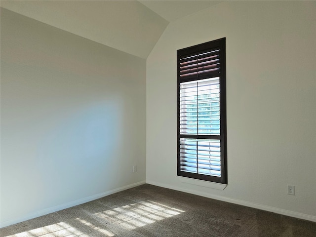 22106 Flashing Ridge Dr, Spring, TX 77389 - spare room with dark colored carpet and lofted ceiling