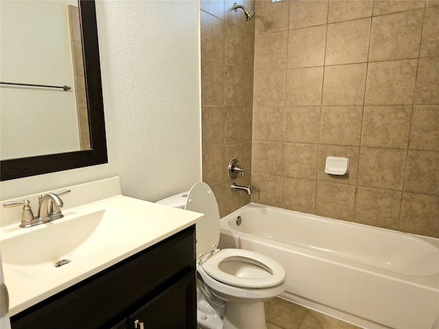 22106 Flashing Ridge Dr, Spring, TX 77389 - bathroom featuring a textured wall, vanity, and washtub / shower combination