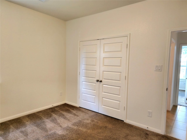 22106 Flashing Ridge Dr, Spring, TX 77389 - unfurnished bedroom with carpet and a closet