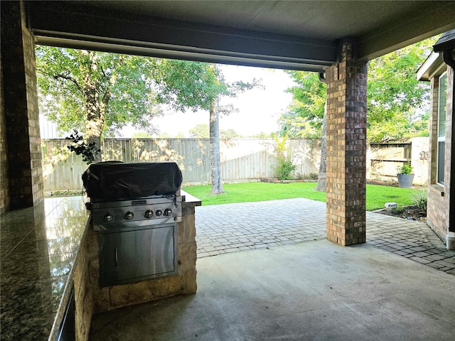 22106 Flashing Ridge Dr, Spring, TX 77389 - fenced backyard featuring grilling area and a patio
