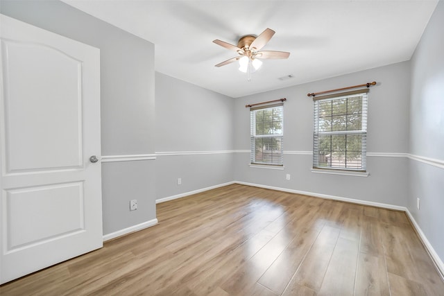 21614 Bowcreek Ln, Katy, TX 77449 - empty room featuring wood finished floors and ceiling fan