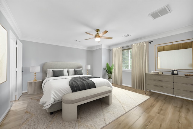 21614 Bowcreek Ln, Katy, TX 77449 - bedroom featuring light wood finished floors, ornamental molding, and ceiling fan