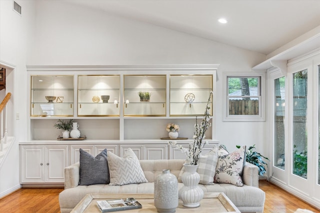 13307 Westport Ln, Houston, TX 77079 - living area with lofted ceiling, light wood finished floors, and recessed lighting