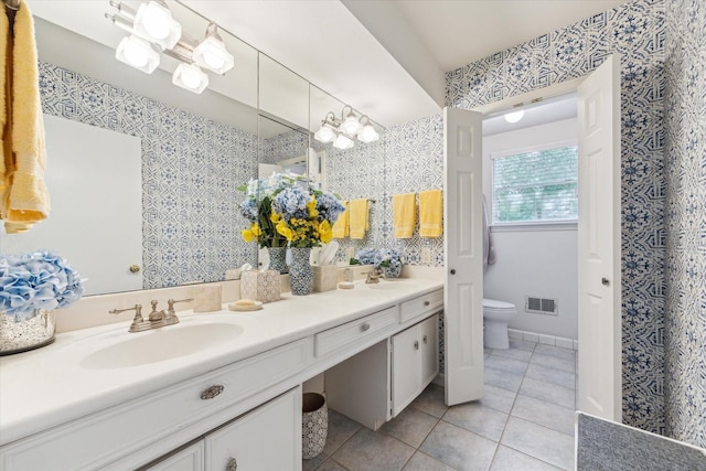 13307 Westport Ln, Houston, TX 77079 - bathroom featuring vanity, wallpapered walls, and tile patterned flooring