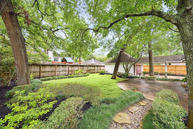 13307 Westport Ln, Houston, TX 77079 - fenced backyard with a patio area