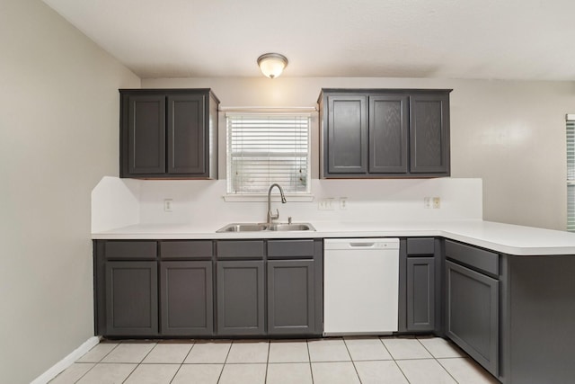 19115 Forest Ridge Dr, Magnolia, TX 77355 - kitchen with dishwasher, a peninsula, light countertops, and light tile patterned floors