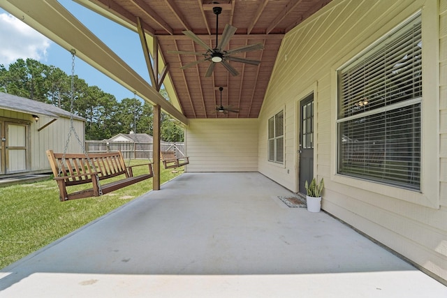 19115 Forest Ridge Dr, Magnolia, TX 77355 - view of patio featuring a ceiling fan and a storage unit
