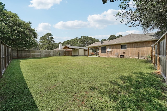 19115 Forest Ridge Dr, Magnolia, TX 77355 - fenced backyard featuring a shed