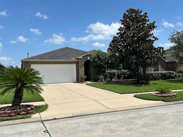 11618 Wren Crossing Dr, Houston, TX 77038 - view of front of home featuring an attached garage, driveway, brick siding, a front yard, and a shingled roof
