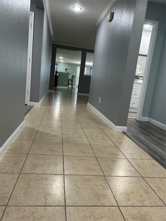 11618 Wren Crossing Dr, Houston, TX 77038 - hall featuring ornamental molding and tile patterned flooring